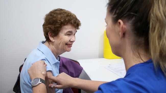 Pamela Rawson with nurse Emma McCallum getting the COVID-19 AstraZeneca vaccine at the Sydney Road Family Medical Practice. Picture: Lisa Maree Williams/Getty Images