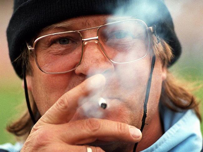 NSW State of Origin coach Tom (Tommy) Raudonikis enjoys smoking cigarette during training for game 2 of 1997 ARL series at MCG 10/06/97.  Rugby League P/