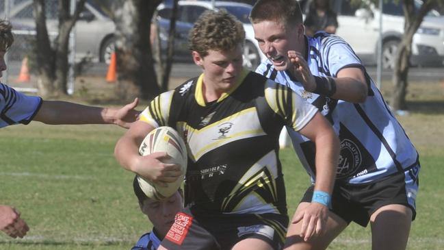 Michael Hughes takes on the defence in the under-15 Group 1 grand final between the Clarence Coast Magpies and the Ballina Seagulls at Frank McGuren Field in 2019.