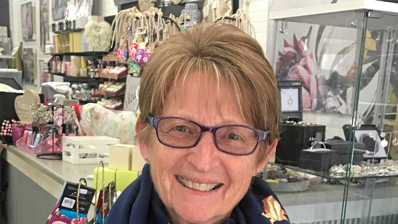STYLISH SUPPORT: Coco and Blush Pittsworth customer Kay Morgan models a scarf designed to help the drought relief effort. Picture: Contributed