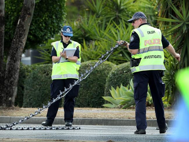 Crash investigation police deploy a Stinger spike system (FILE PHOTO). Photographer: Liam Kidston.