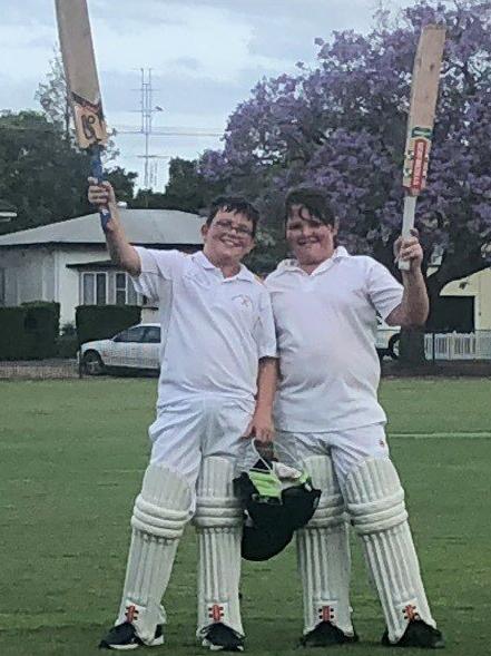 Westlawn’s Eli Jones and Sam Buggy raise the bat after a top notch batting effort in 2018.