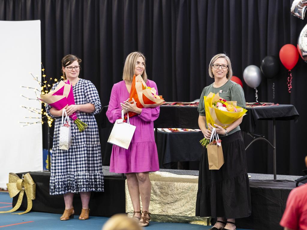 Sacred Heart Primary School teaching staff including (from left) Heidi Kelly, Mallory Anderson and Mandy Johnson are thanked for their service at the awards presentation and Yr 6 graduation, Friday, December 2, 2022. Picture: Kevin Farmer