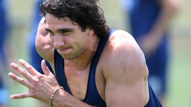 Geelong Cats training at Deakin Uni. Nakia Cockatoo goes through a gruelling running session in 33 deg heat at training. Picture: Mike Dugdale