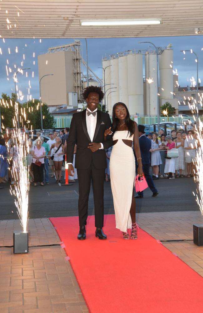 Toowoomba school formals. At the 2023 St Ursula's College formal is graduate Afeng Kag with her partner. Picture: Rhylea Millar