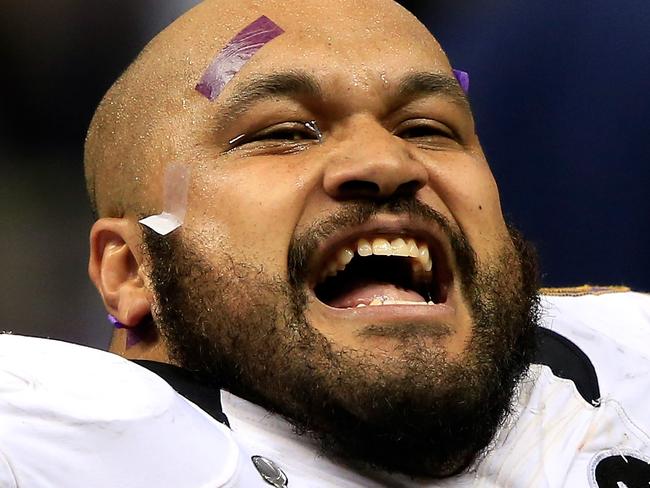 NEW ORLEANS, LA - FEBRUARY 03: Ma'ake Kemoeatu #96 of the Baltimore Ravens celebrates following their win against the San Francisco 49ers during Super Bowl XLVII at the Mercedes-Benz Superdome on February 3, 2013 in New Orleans, Louisiana. The Ravens defeated the 49ers 34-31. (Photo by Jamie Squire/Getty Images)