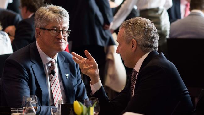 AFL chair Mike Fitzpatrick and Telstra CEO Andy Penn in the Olympic Room of the MCG during the AFL Grand Final. Pic: AFL Media