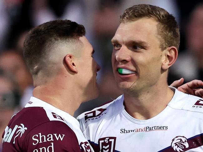 SYDNEY, AUSTRALIA - JULY 21: Tom Trbojevic of the Sea Eagles celebrates with team mate Reuben Garrick after scoring a try during the round 20 NRL match between Manly Sea Eagles and Gold Coast Titans at 4 Pines Park, on July 21, 2024, in Sydney, Australia. (Photo by Brendon Thorne/Getty Images)