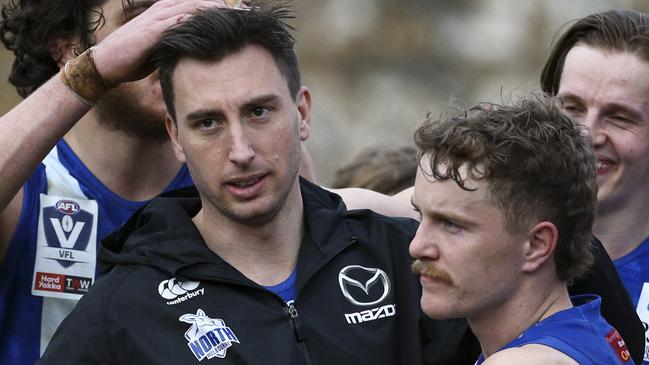 Wright (left) played 136 AFL games for North Melbourne and was an assistant coach for the Roos’ AFLW side this season as they reached the grand final but lost to Brisbane. Picture: Luke Hemer / Getty Images