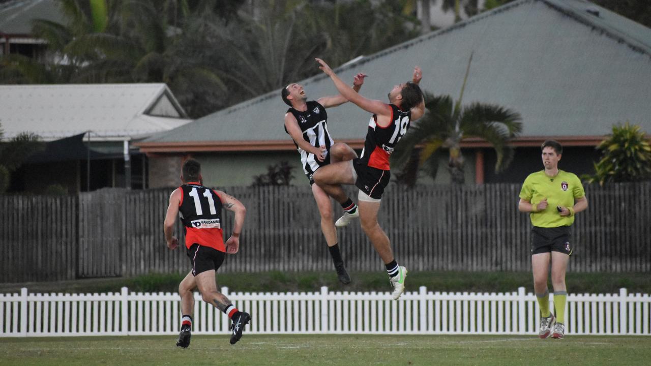 Nick Thiele and Liam Byrne in the North Mackay Saints v Mackay Magpies AFL premier grand final, September 11, 2021. Picture: Matthew Forrest