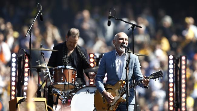 Aussie music icon Paul Kelly performs at the 2019 AFL grand final. Picture: Ryan Pierse