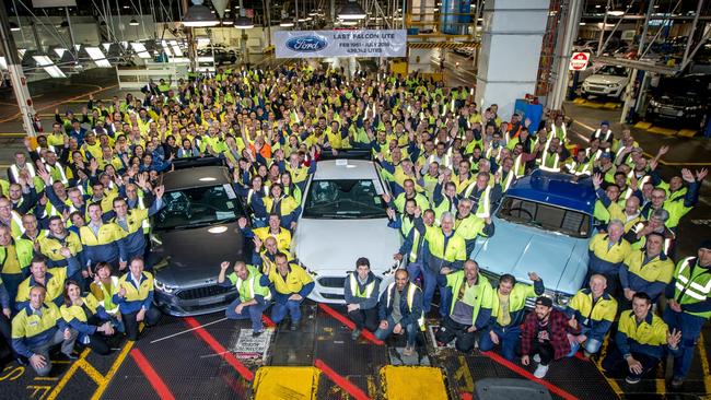 Ford workers send off the last Falcon ute (centre) on the Broadmeadows production line on 29 July 2016. The factory will fall silent forever on October 7 2016, when the last Falcon sedan and Territory SUV are built. Picture: Supplied.