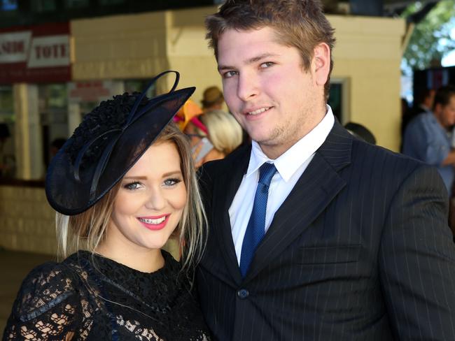 Ladies Day at Cluden Park Racecourse. 21/07/2012. Picture: Michael Chambers. Jordana Nielsen and Kyle Deveth.