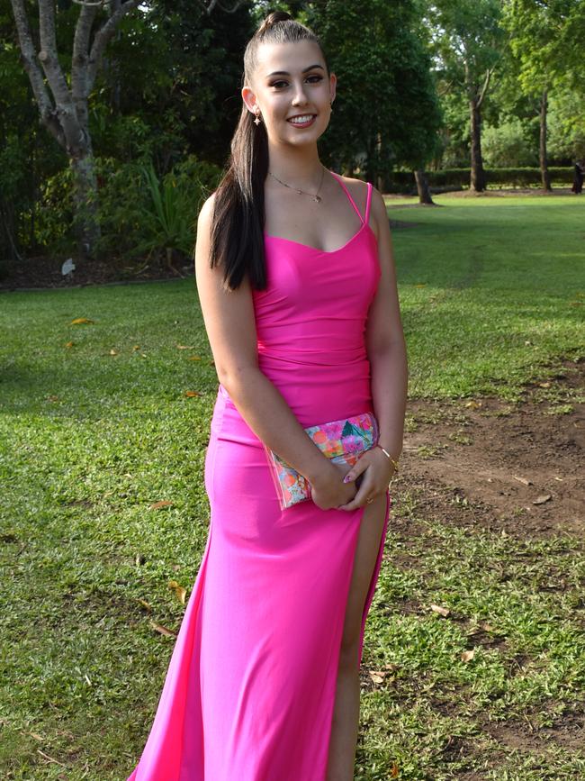 Kaitlin Scott wore and eye catching pink dress to at the Mackay State High School 2021 Year 12 formal, November 16, 2021. Photo: Tara Miko and Janessa Ekert