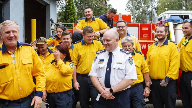 Commissioner Shane Fitzsimmons (centre) talks to RFS members at Horsley Park. Picture: Jenny Evans/Getty Images