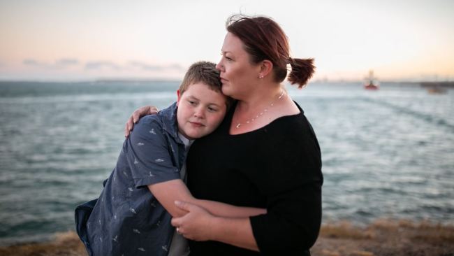 Ethan with his mum Sam. Picture: ABC/Mridula Amin