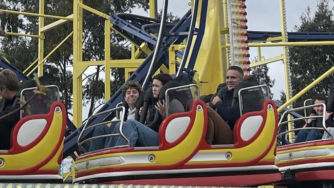 Premier Peter Malinauskas on the Big Dipper with his kids on the last day of the Royal Adelaide Show. Picture: Evangeline Polymeneas