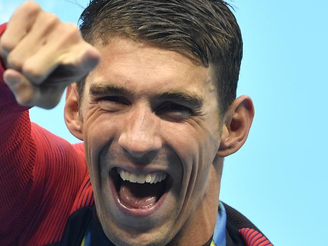 United States' Michael Phelps celebrates after winning the gold medal in the men's 4x100-meter final during the swimming competitions at the 2016 Summer Olympics, Monday, Aug. 8, 2016, in Rio de Janeiro, Brazil. (AP Photo/Martin Meissner)