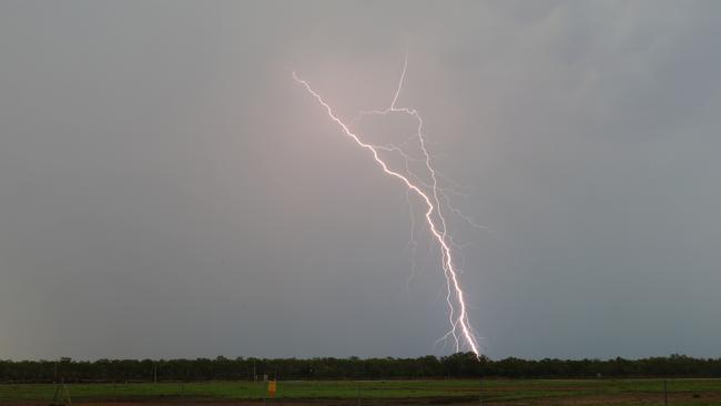 Lightning strikes over Fogg Dam amidst the tranquil wetlands. Picture: Chris Garth