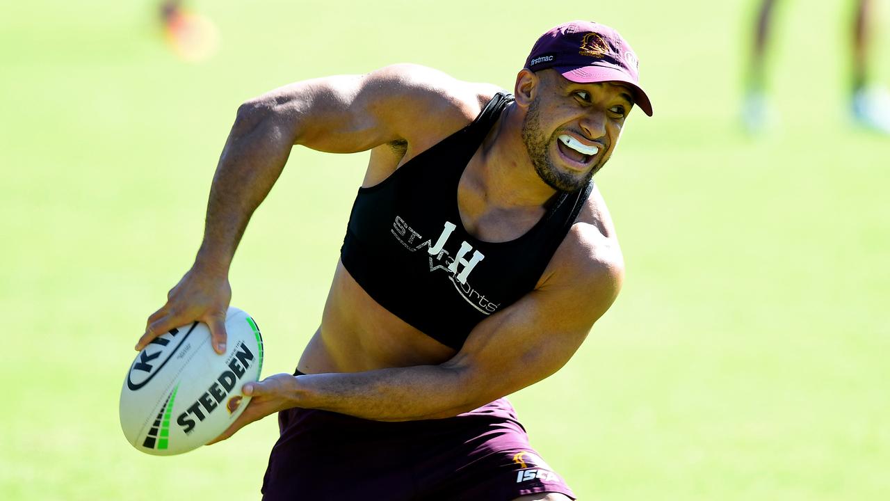 Jamil Hopoate passes the ball during a Brisbane Broncos NRL training session.