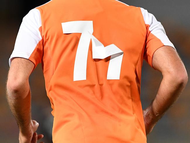 The shirt numbers of Roar player Ivan Franjic are seen to dislodge during the Preliminary Stage 2 AFC Champions League match between the Brisbane Roar and Ceres Negros FC at the Queensland Sports and Athletics Centre in Brisbane, Tuesday, January 23, 2018.  (AAP Image/Dave Hunt) NO ARCHIVING, EDITORIAL USE ONLY