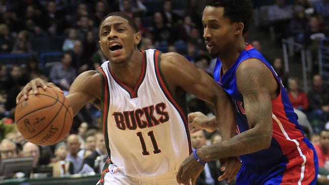 Detroit Pistons guard Brandon Jennings, right, fouls Milwaukee Bucks guard Brandon Knight.