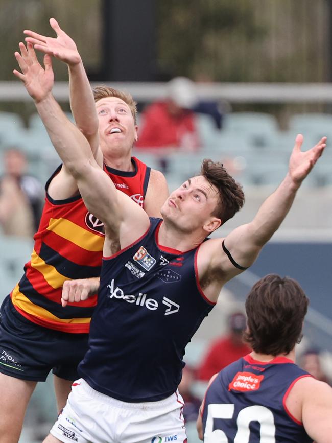 Kieran Strachan and Harry Boyd contest the ball during the SANFL preliminary final at Adelaide Oval. Picture: David Mariuz/SANFL