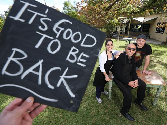 Arnie Rossis in 2014, returning to run with Rymill Park kiosk after his cancer treatment, with his daughter Leah and son-in-law Nick. Picture: Tait Schmaal.