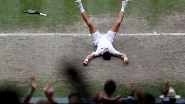Novak Djokovic after winning match point in the final at Wimbledon. Photo by Peter Nicholls - Pool/Getty Images