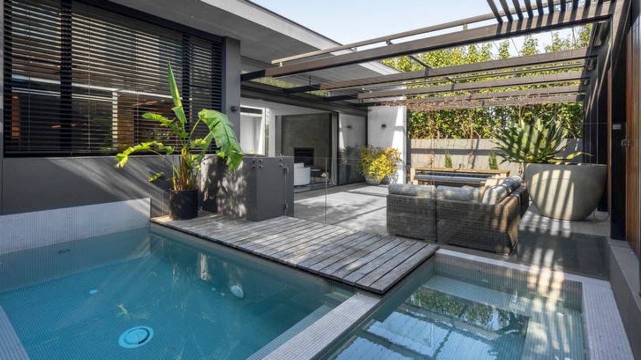 Remote-operated sunshades can be used to cover the backyard during warm weather.