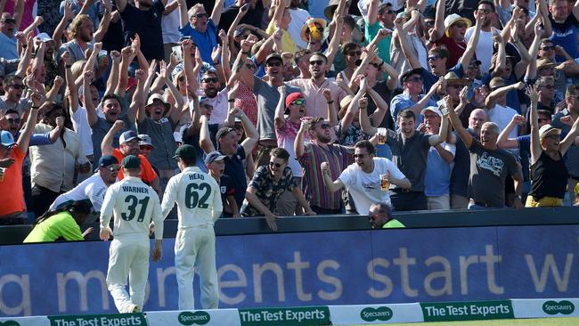 Fans in Headingley’s Western Terrace celebrate England’s Third Test victory. Picture: Getty Images