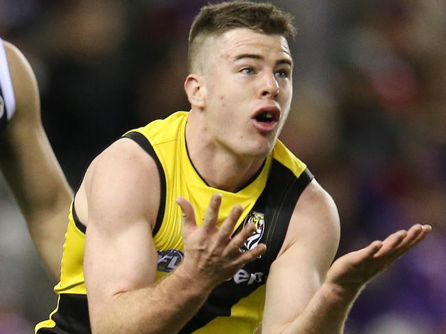 Round 18. 20/07/2018. St Kilda v Richmond at Etihad Stadium.   Richmond's Jack Higgins marks on the lead 3rd qtr  . Pic: Michael Klein