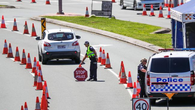 Police patrol the Queensland border on the Gold Coast Highway. Picture: Nigel Hallett