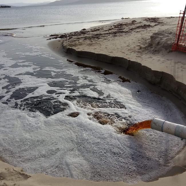 Effluent spewing out at Blue Lagoon corner of Red Ochre beach, Dodges Ferry.