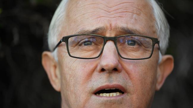 Former prime minister Malcolm Turnbull speaks to the media outside his home in Point Piper yesterday.