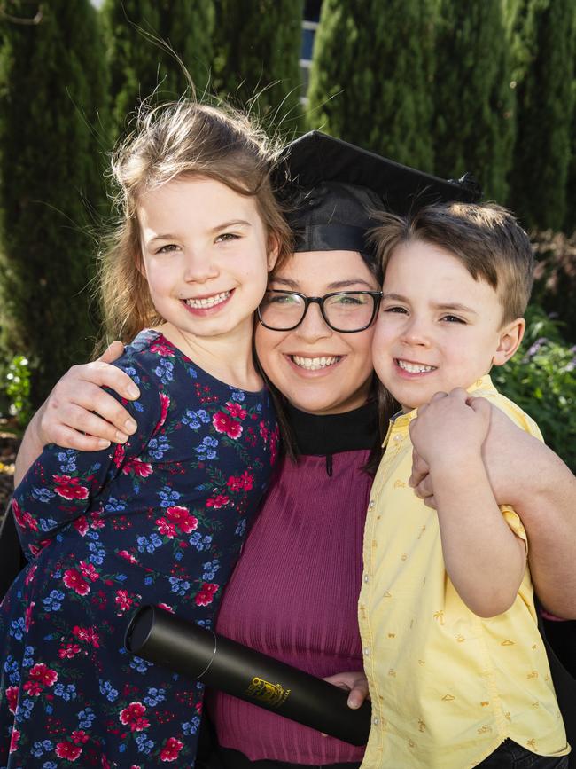 Bachelor of Biomedical Sciences graduate Maddi Geyer with her daughter Ava Loomans and son Noah Loomans at a UniSQ graduation ceremony at Empire Theatres, Wednesday, June 28, 2023. Picture: Kevin Farmer