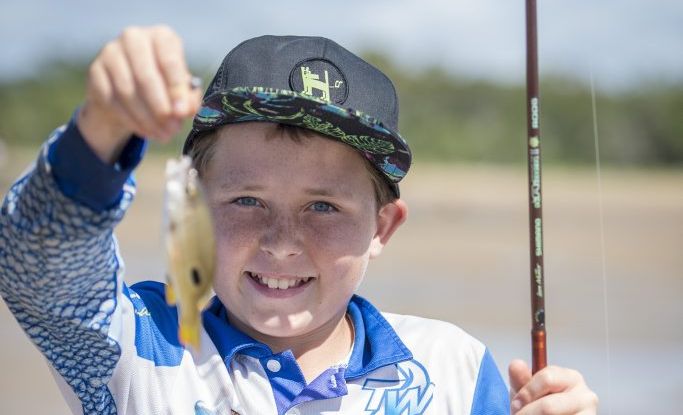 PHOTO GALLERY Johnny Mitchell has the kids hooked The Courier Mail