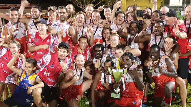 Winners are grinners: Katherine Souths players show off their 2020 BRFL premiership Cup. Picture: Grey Morris