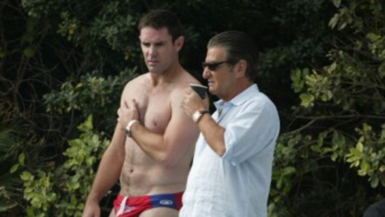  Roosters at Bungan Beach, coach Brad Fittler and Chairman, Nick Politis. 