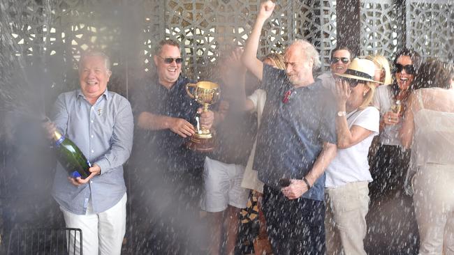 Twilight Payment’s co-owners celebrate their Melbourne Cup win at The Prince of Wales Hotel in St Kilda. Picture: Josie Hayden