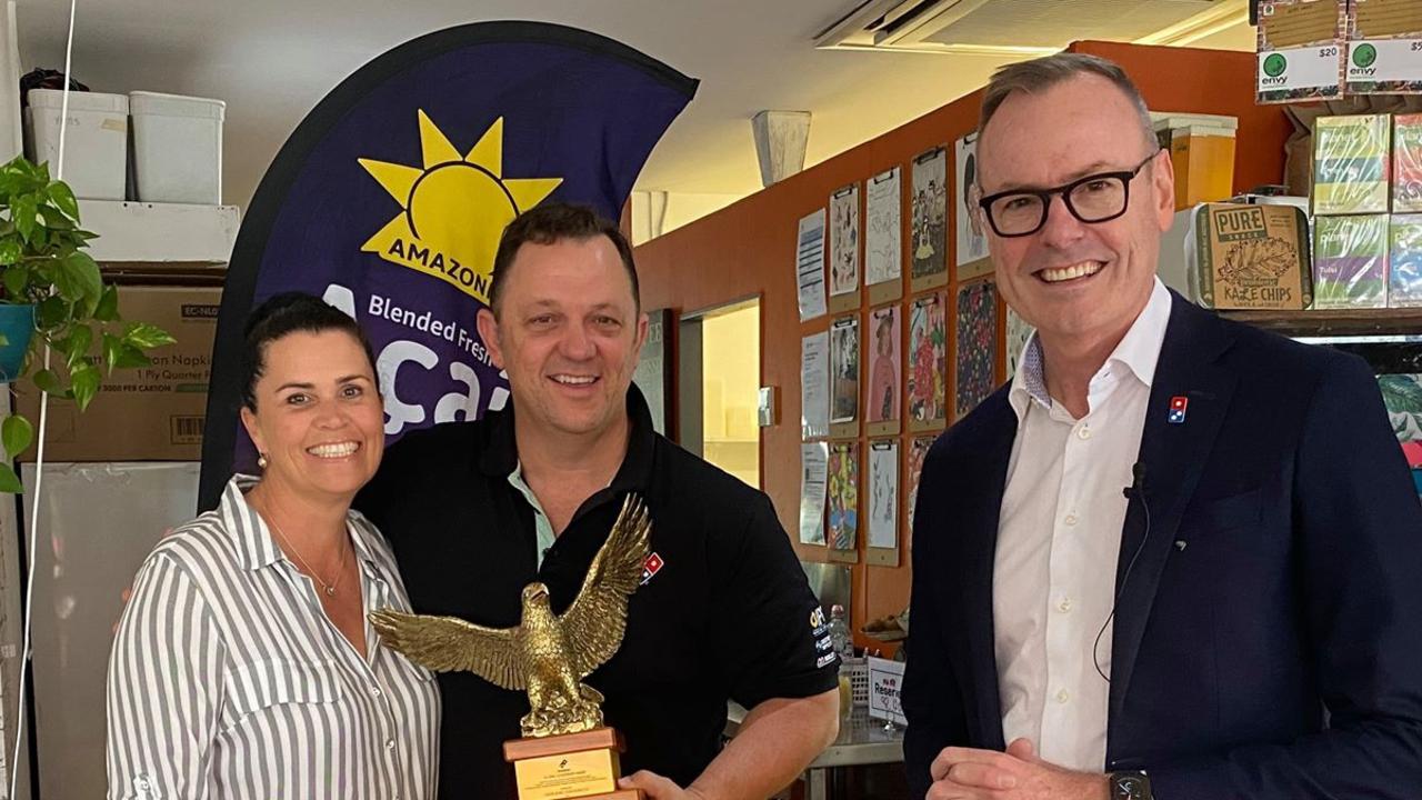 Gympie Domino's franchisees David and Melissa Burness with Domin's Group CEO and Managing Director Don Mei.