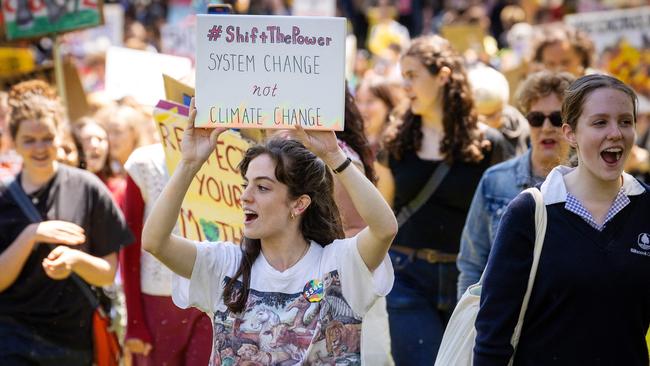 Young people march with home-made placards. Picture: Mark Stewart