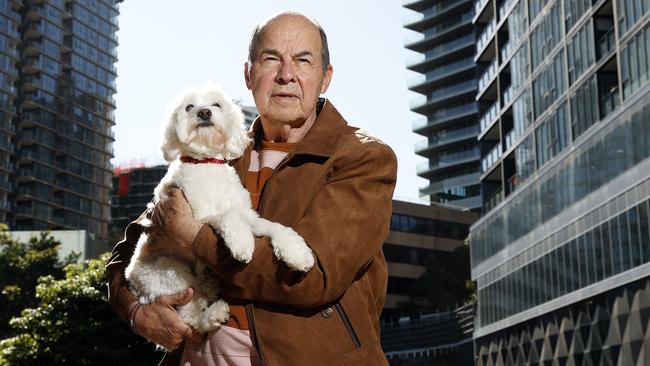 WEEKEND TELEGRAPHS SPECIAL. MUST TALK WITH PIC ED JEFF DARMANIN BEFORE PUBLISHING - Pictured in St Leonards is Retiree Paul Christopher with dog Macy, whose apartment will be plunged into shade all year round as a result of two new commercial buildings proposed for near him. Picture: Tim Hunter.