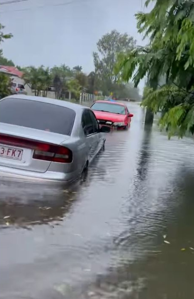 Cars in water along Burt St, Aitkenvale on Thursday morning. Picture: Facebook/Maclane Ellems