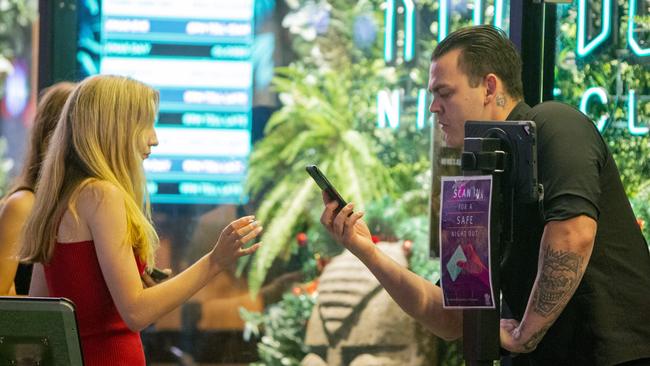 Staff at Lost Kingdom Nightclub in Surfers Paradise check vaccination status of patrons on entry over the weekend. Picture: Jerad Williams