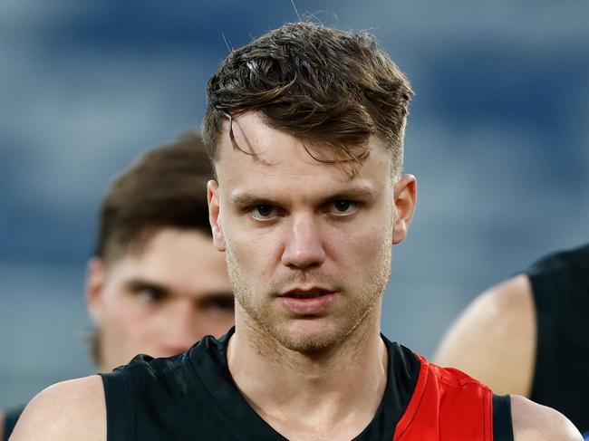 GEELONG, AUSTRALIA - MARCH 01: Jordan Ridley of the Bombers is seen after injuring his quad during the 2024 AFL AAMI Community Series match between the Geelong Cats and Essendon Bombers at GMHBA Stadium on March 01, 2024 in Geelong, Australia. (Photo by Michael Willson/AFL Photos via Getty Images)