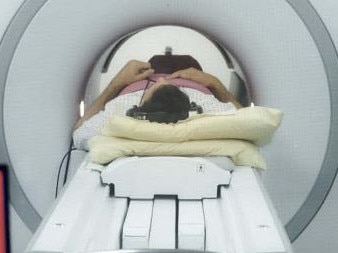 Brain imaging and transcranial magnetic stimulation treatment at the Queensland Neurostimulation Centre. Photo Supplied.