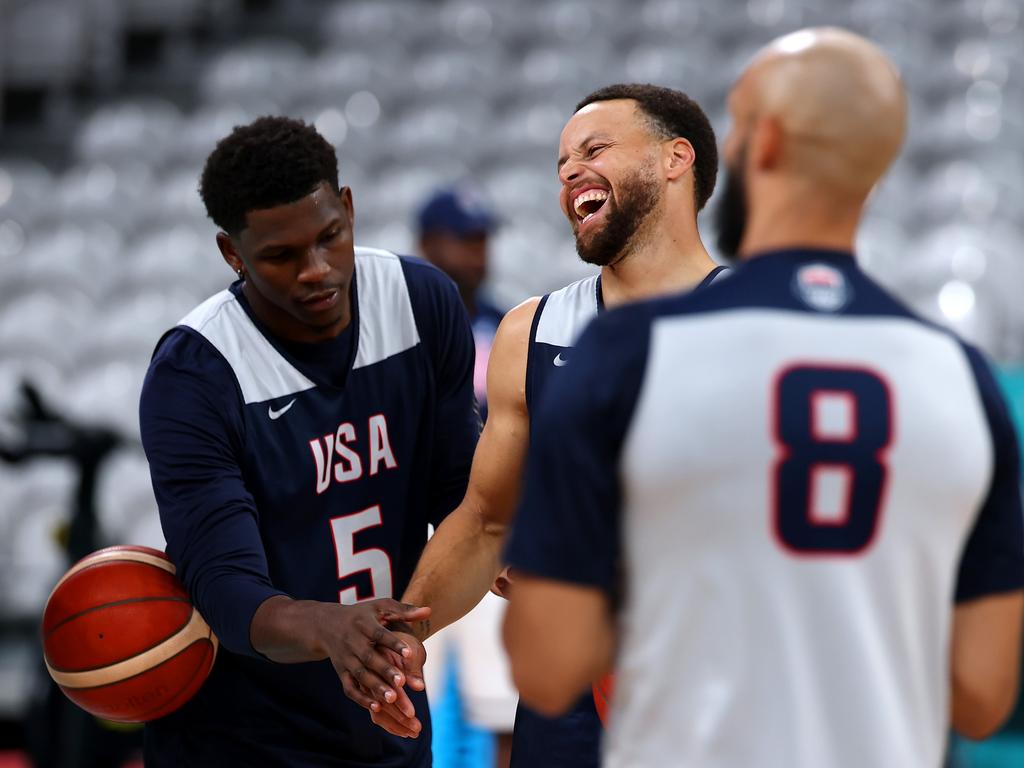 Curry jokes with Anthony Edwards during the a training session ahead of the Games. Picture: Gregory Shamus/Getty Images