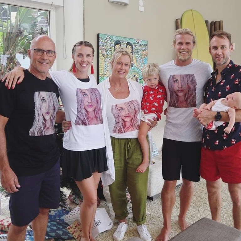 Lisa shared this moving photo of the family sporting a T-shirt with a printed image of Jaimi Kenny, 33, who tragically died three months ago. Picture: Instagram/LisaCurry