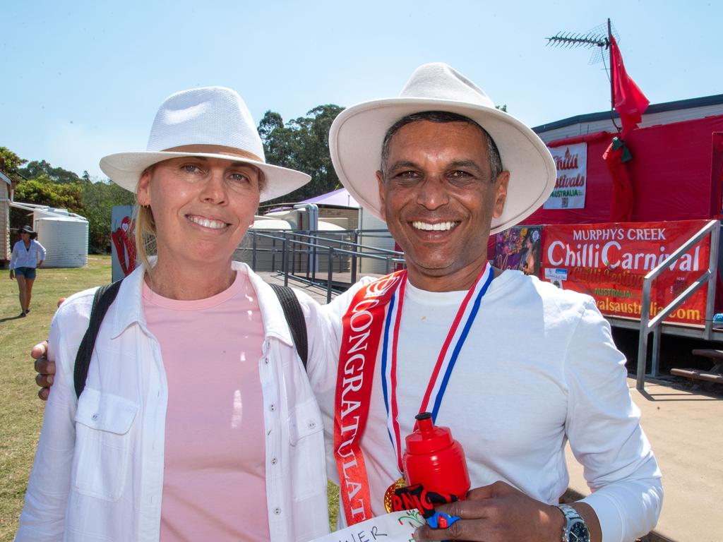 Roseanne Kirkham and the winner of the Cracker’s Hot Chip Challenge, Feisal Abraham at the Murphys Creek Chilli and Craft carnival. Sunday, September 22, 2024. Picture: Nev Madsen